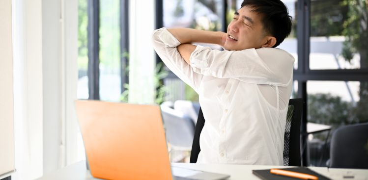 Desk_Exercise_During_Work_FWD_LifePH_Man_Stretching.png